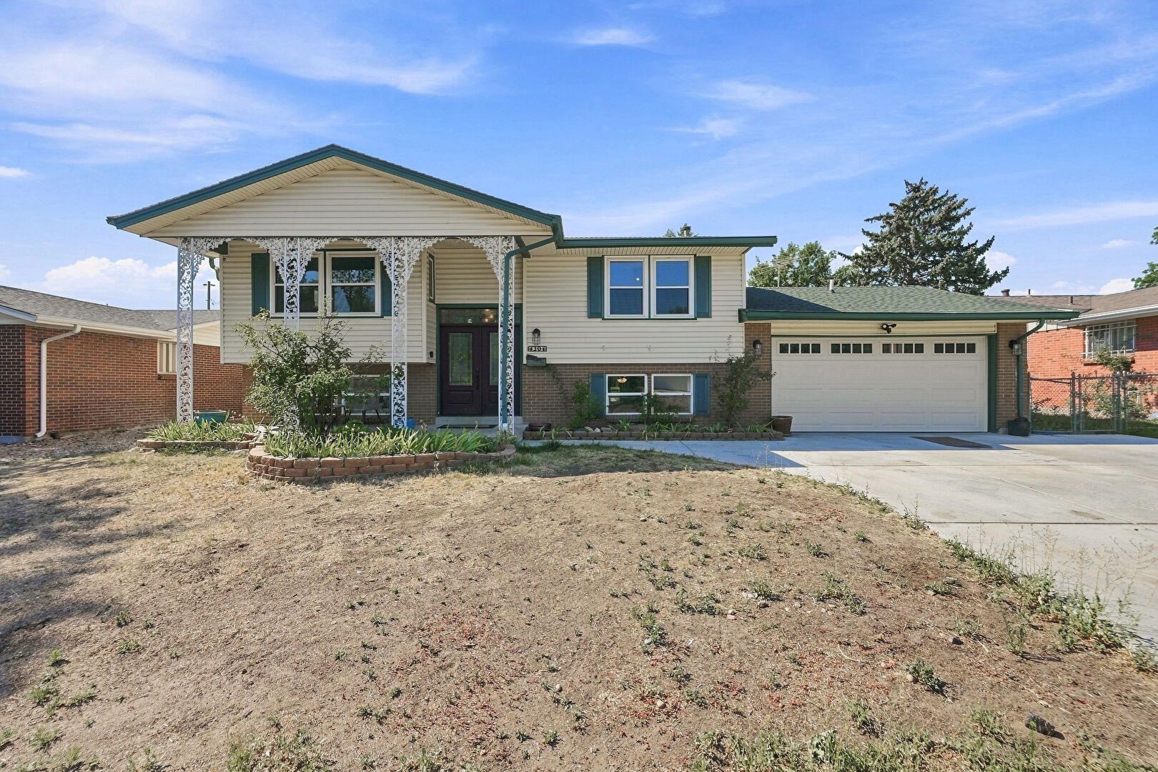 Front at 4204 West Roanoke Place, Denver, CO 80236, listed by Cesar Pena