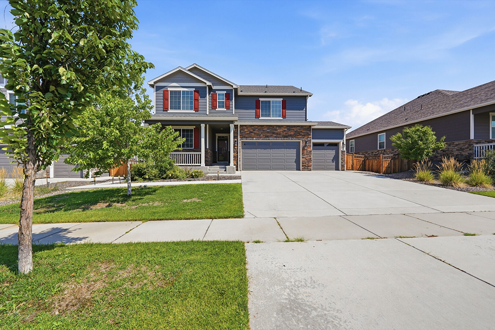 Front at 20051 East 61st Place, Aurora, CO 80019, listed by Greg Livingston