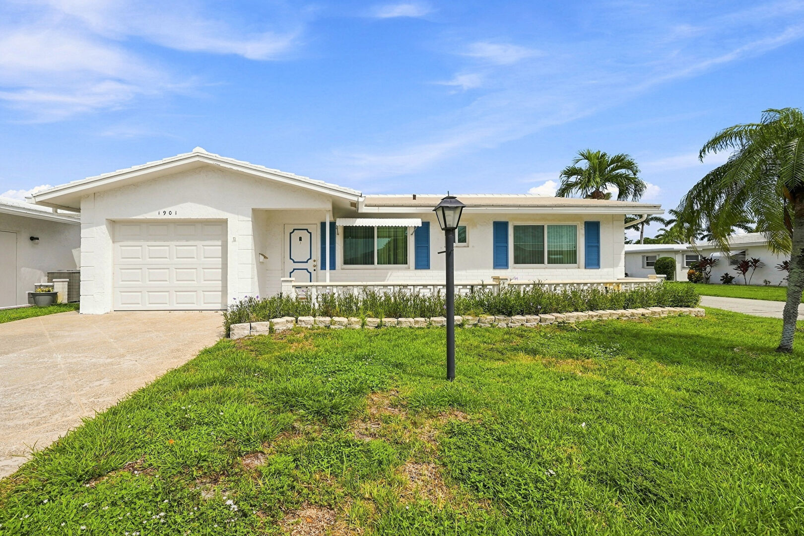Front at 1901 Southwest 17th Street, Boynton Beach, FL 33426, listed by Lori Fink