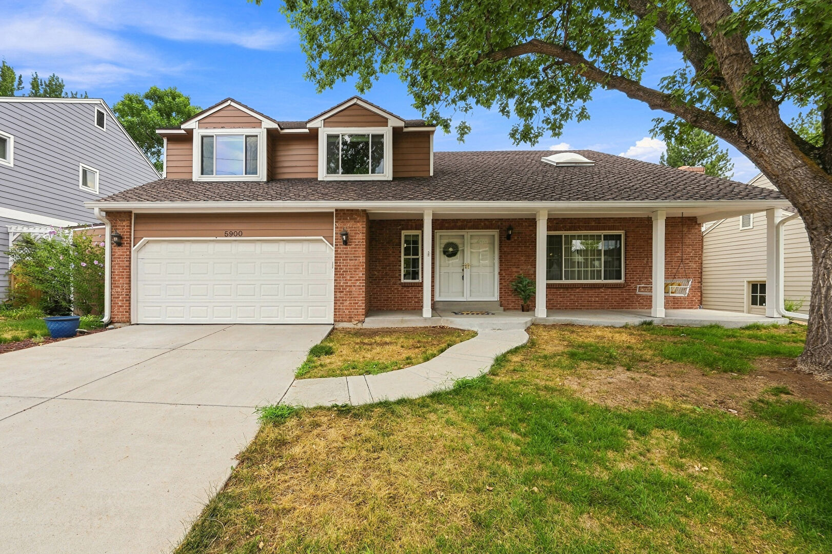 Front at 5900 East Caley Drive, Centennial, CO 80111, listed by Natalie Renatti