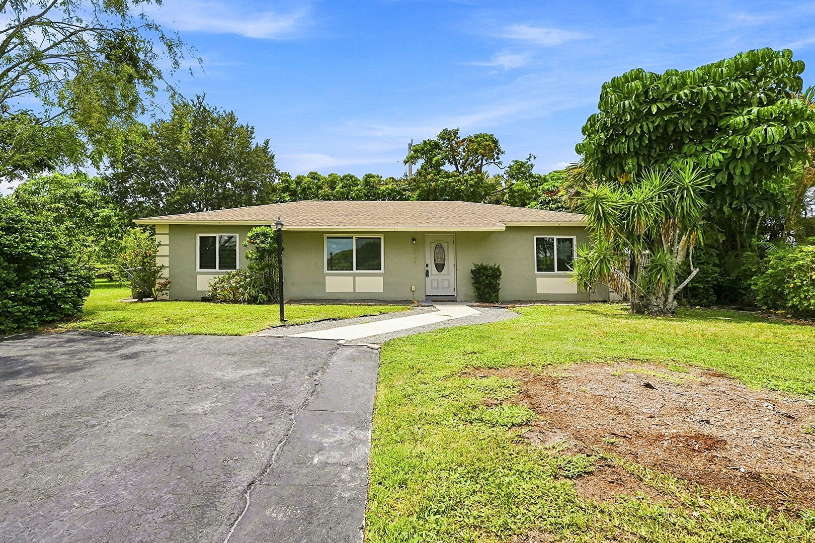 Front at 9734 Alaska Circle, Boca Raton, FL 33434, listed by Seth Cohen
