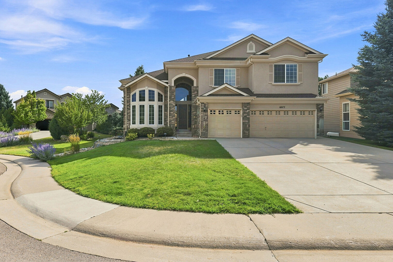 Front at 6072 Vacquero Drive, Castle Pines, CO 80108, listed by Andrew Livingston
