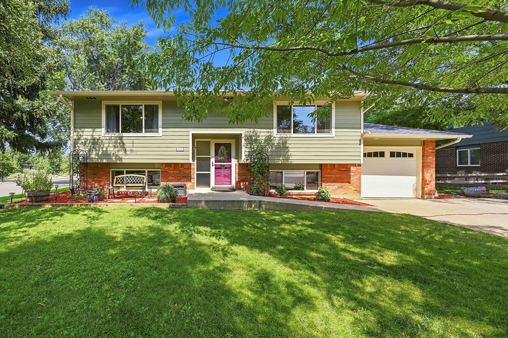 Front at 1524 Chapman Lane, Longmont, CO 80501, listed by Chad Swenson