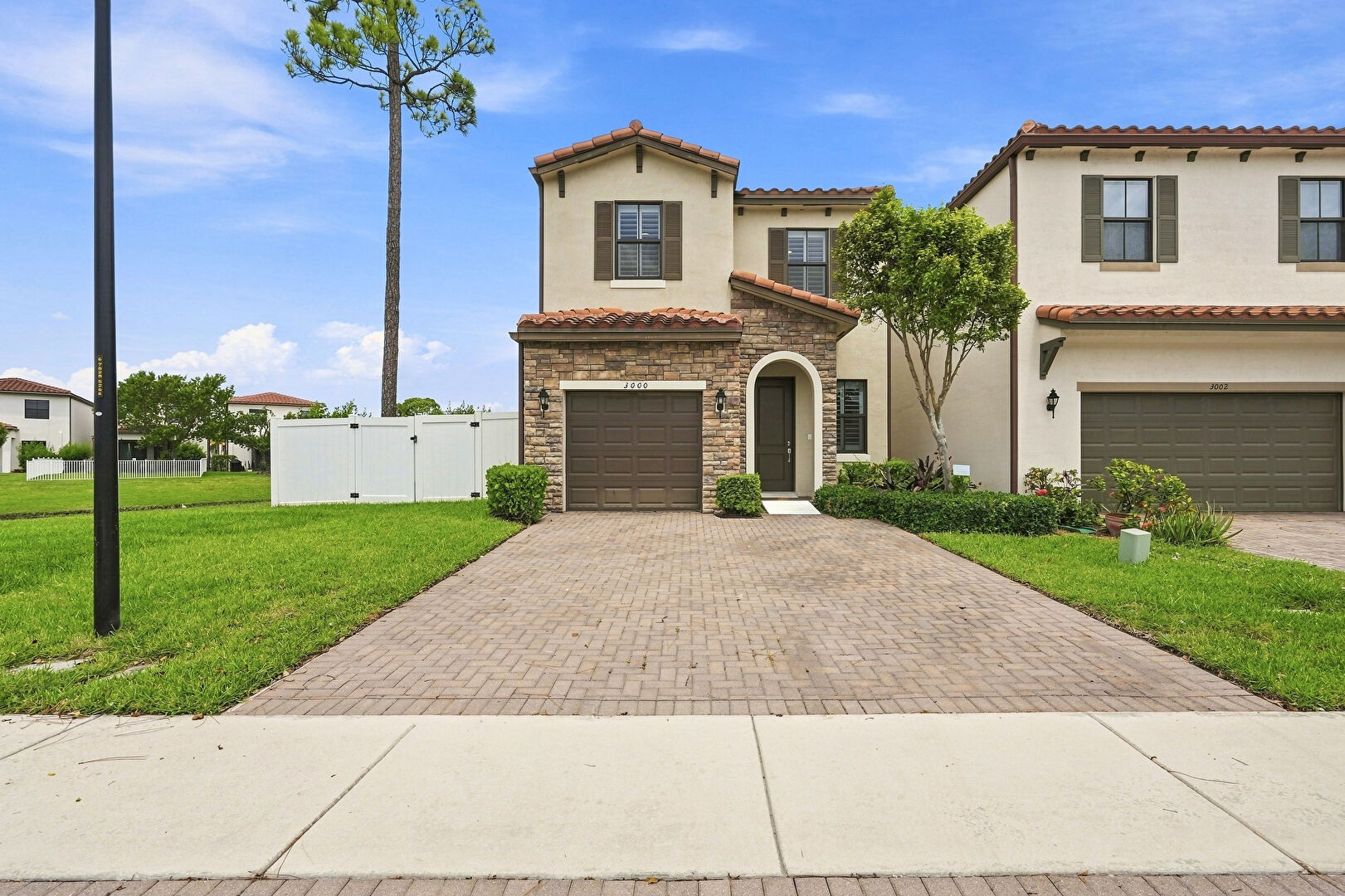 Front at 3000 King Palm Way, Riviera Beach, FL 33410, listed by Teresita Amado