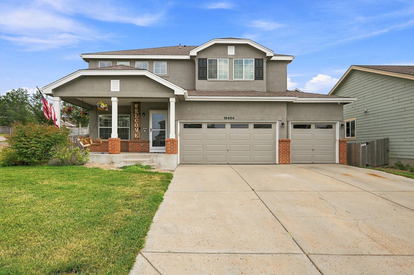Front at 16484 East 107th Place, Commerce City, CO 80022, listed by Matthew Cohen