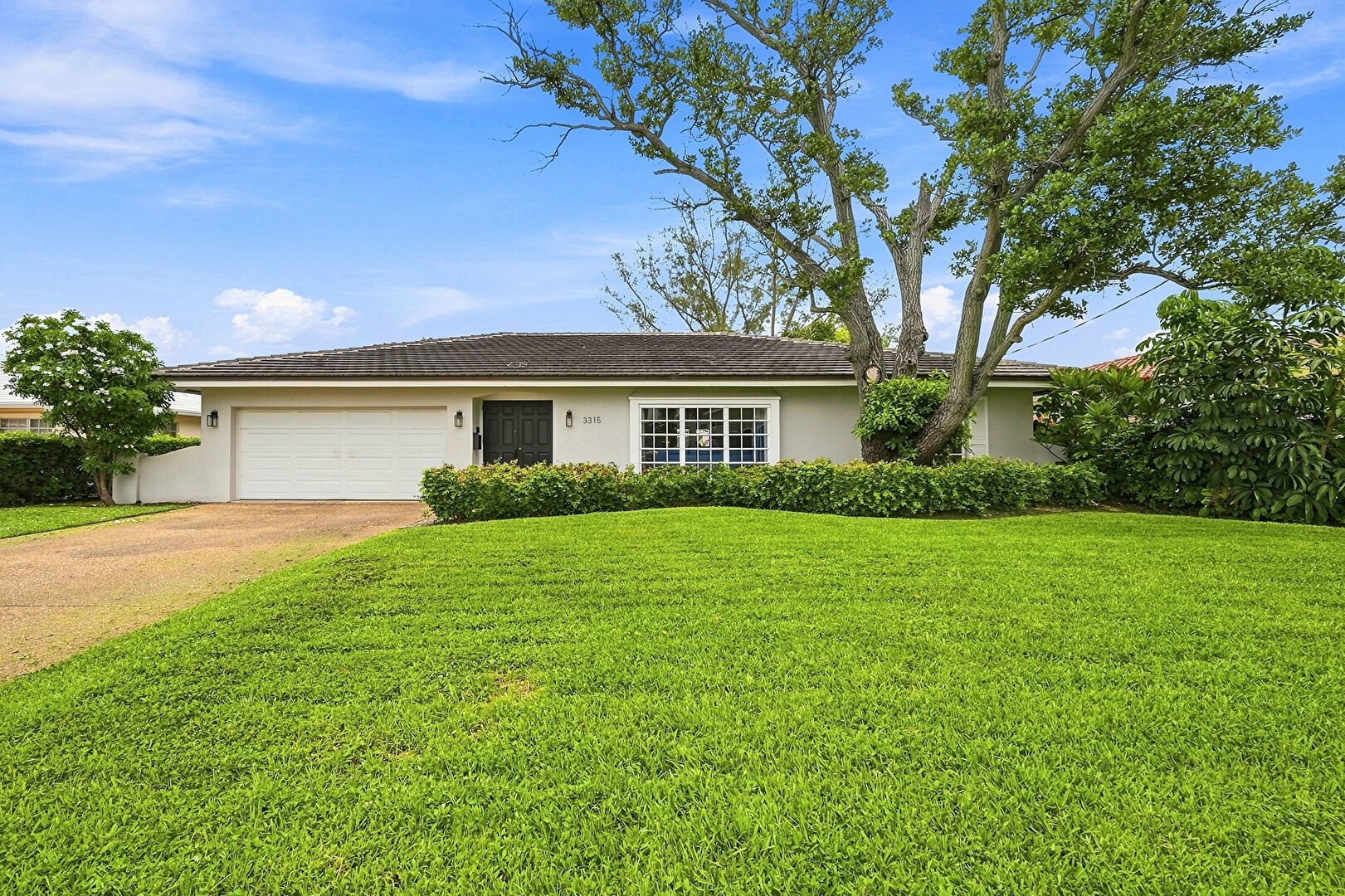 Front at 3315 Northeast 42nd Court, Fort Lauderdale, FL 33308, listed by Ron Lennen