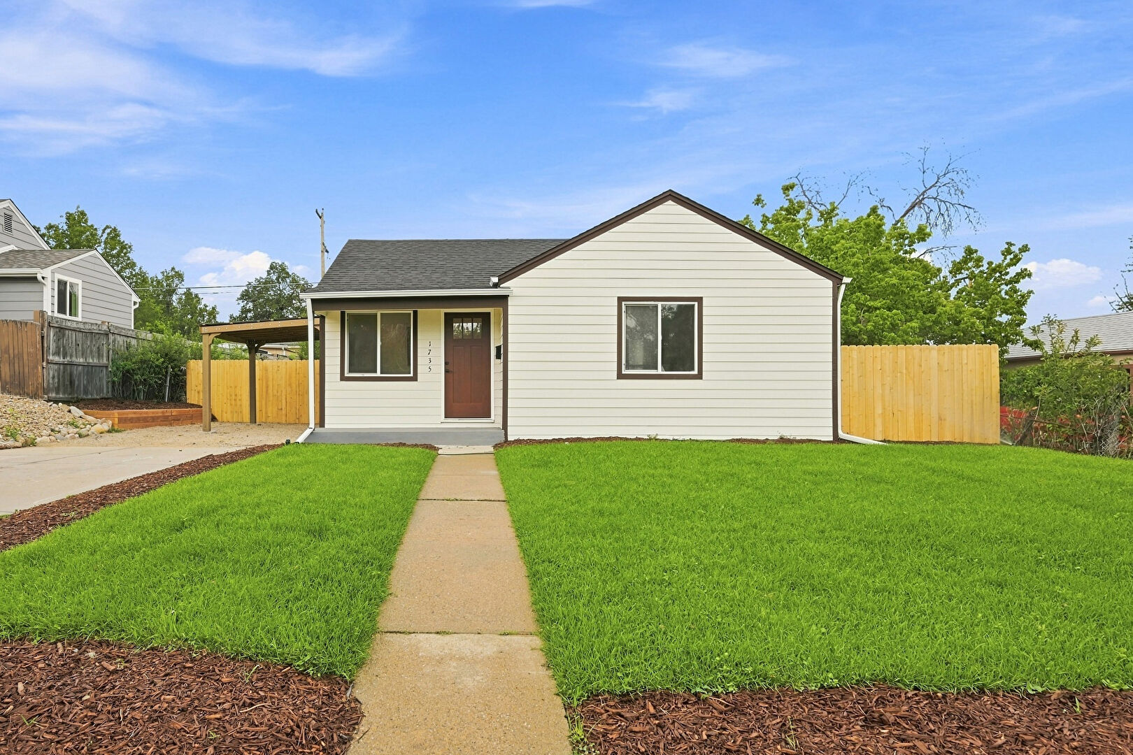 Front at 1735 South Shoshone Street, Denver, CO 80223, listed by Nadia Trevizo-Medina