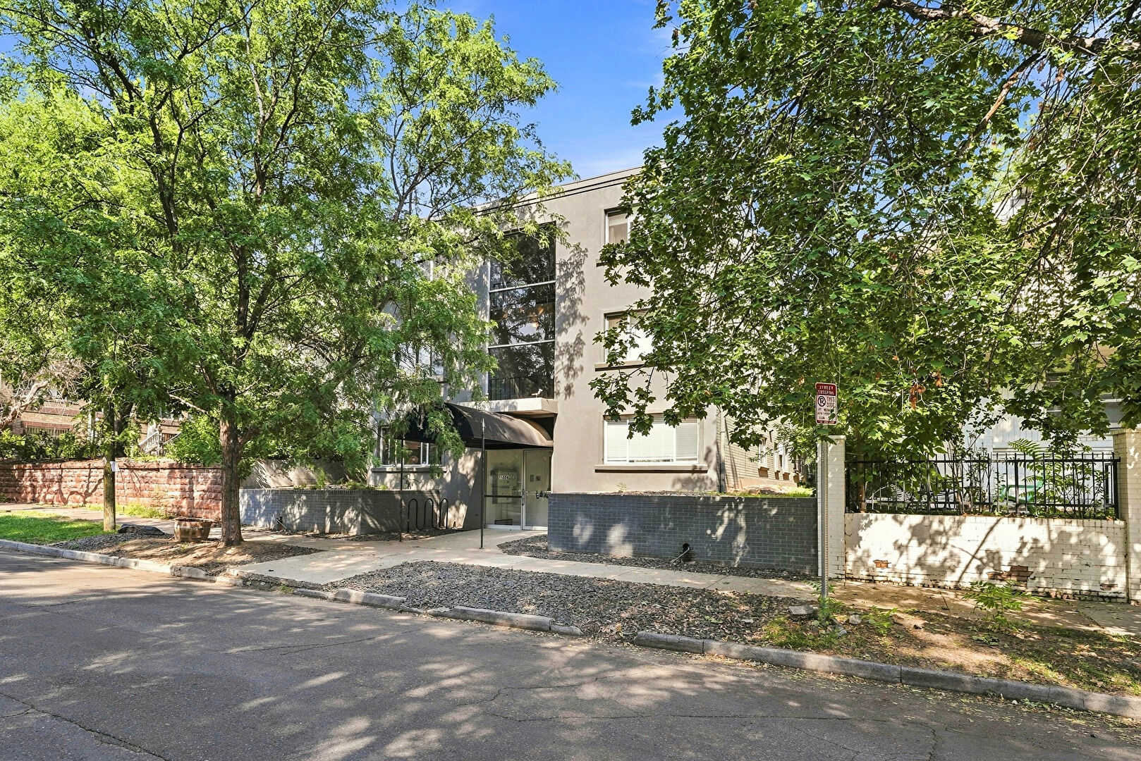 Front at 1056 Marion Street, Uit #203, Denver, CO 80218, listed by Karen Esquibel