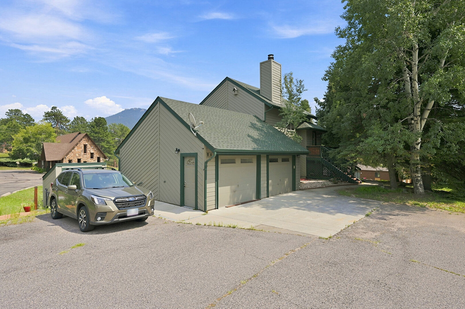 Front at 28248 Harebell Lane, Evergreen, CO 80439, listed by Kimberly Burns