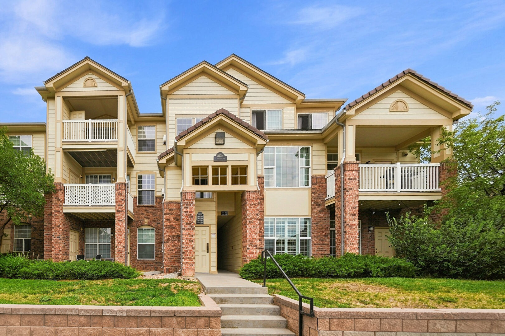 Front at 5723 North Gibralter Way, #4-102, Aurora, CO 80019, listed by Kristen White