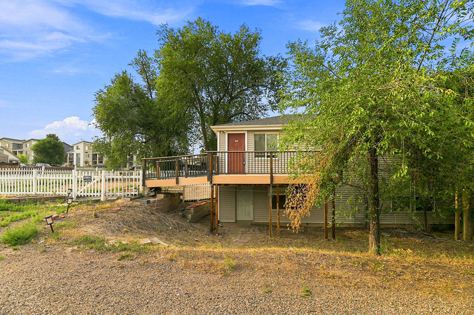 Front at 1570 Simms St 1572, Lakewood, CO 80215, listed by Taylor Haas