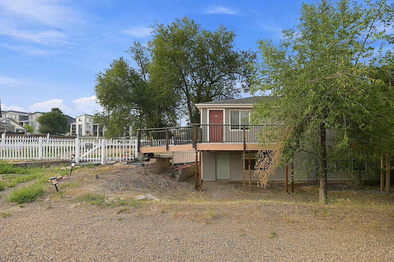 Front at 1570 Simms St 1572, Lakewood, CO 80215, listed by Taylor Haas