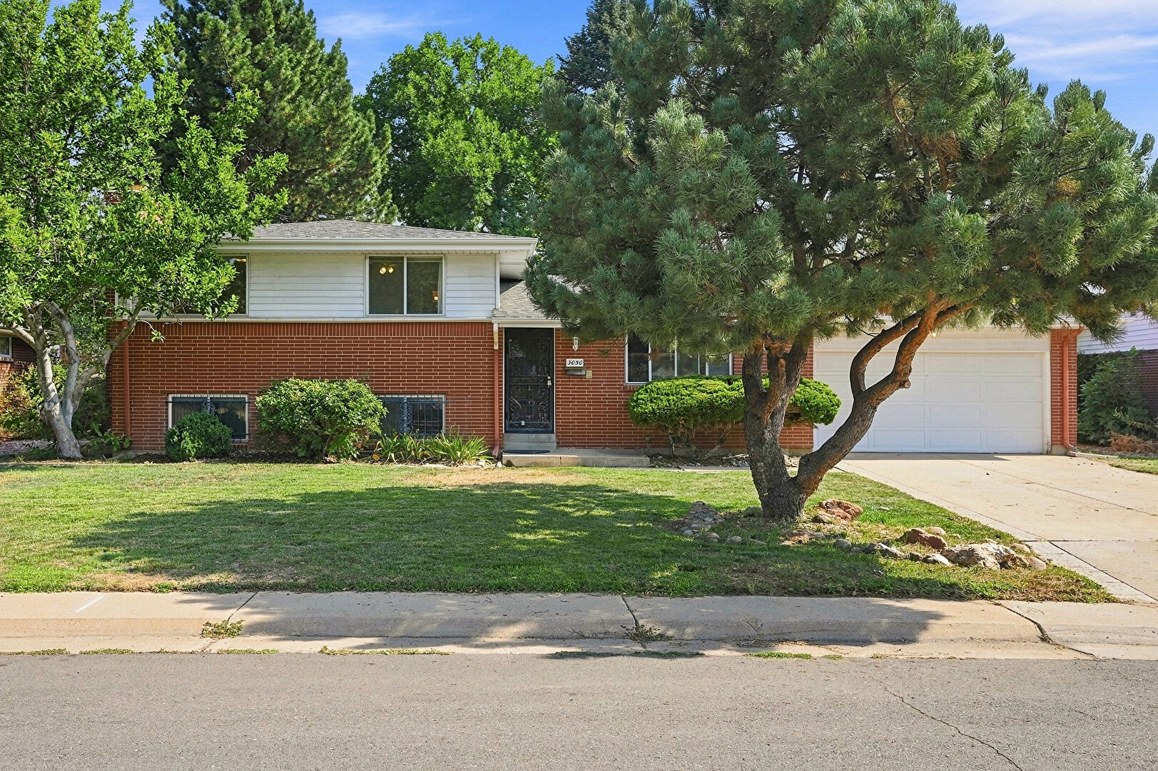 Front at 3050 South Hobart Way, Denver, CO 80227, listed by Dave Everett