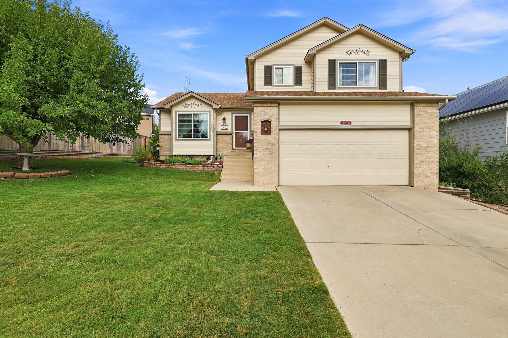 Front at 6640 Quarter Circle Road, Colorado Springs, CO 80922, listed by Vonnetta Johnson
