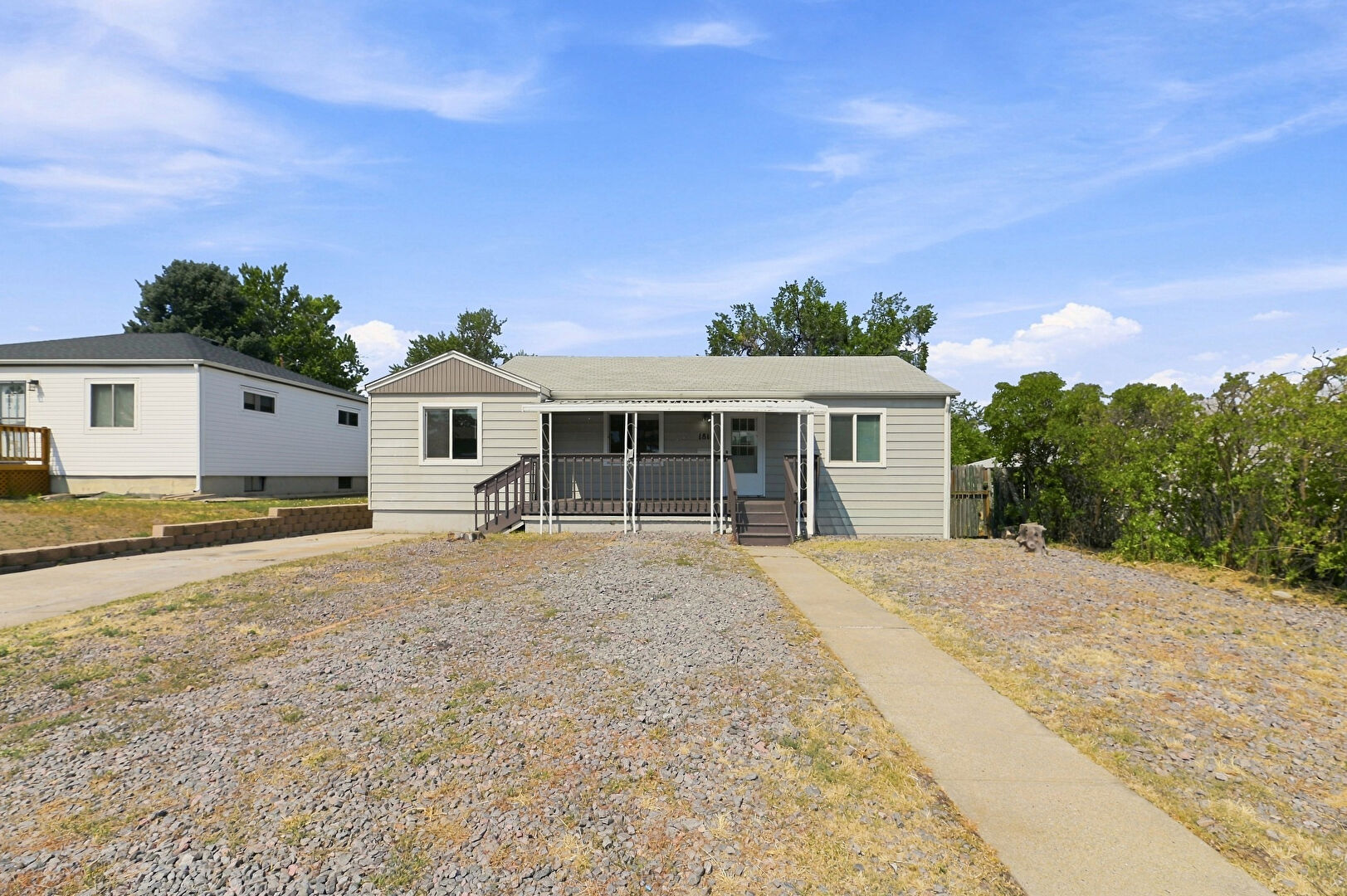 Front at 1811 South Irving Street, Denver, CO 80219, listed by Taylor Haas