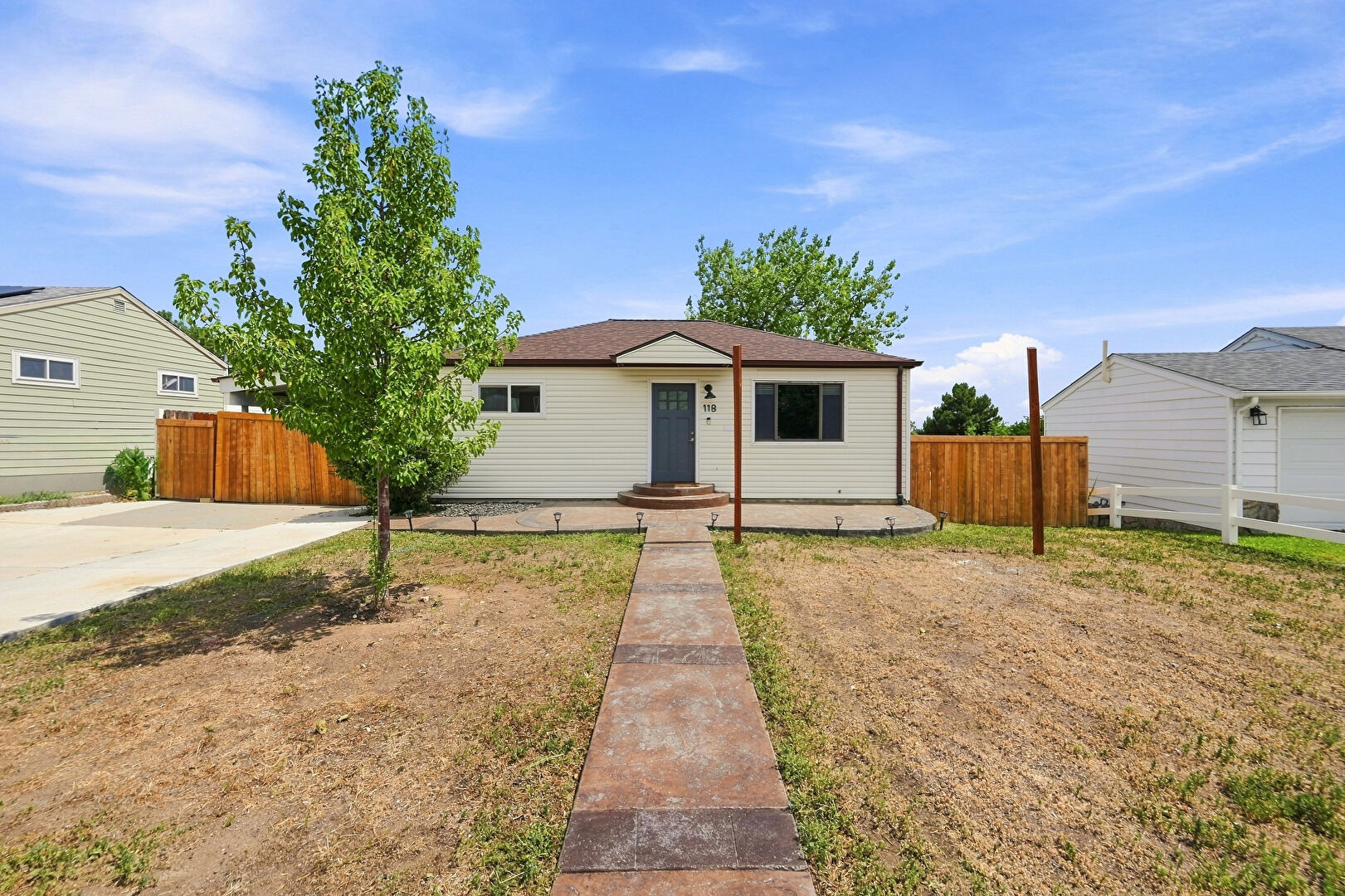 Front at 118 South Yates Way, Denver, CO 80219, listed by Cesar Pena