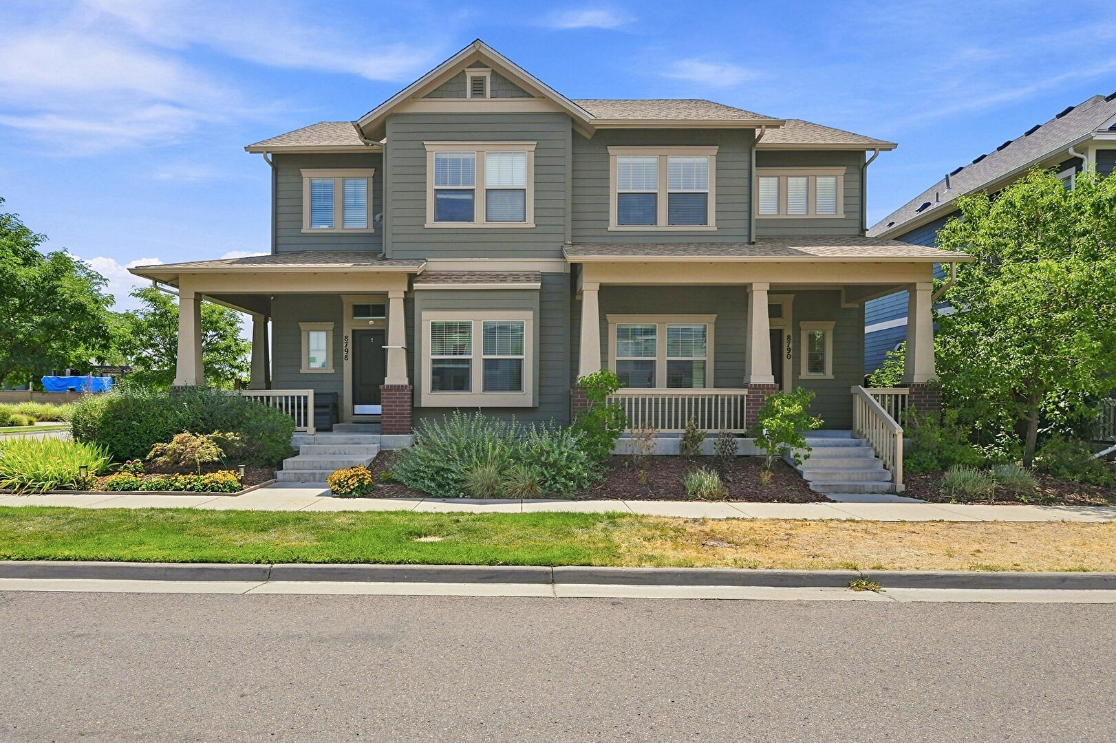 Front at 8790 54th Place, Denver, CO 80238, listed by Carolyn Schilling