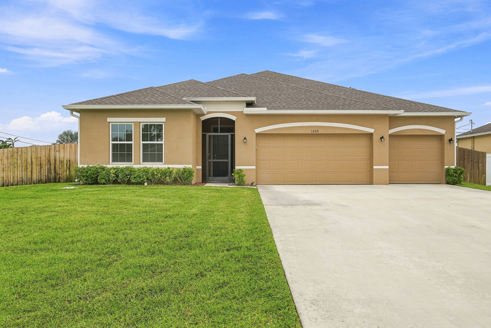 Front at 1008 Southwest Ingrassina Avenue, Port St. Lucie, FL 34953, listed by Johanna Nieves