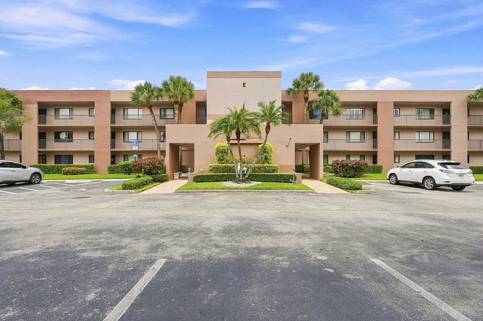 Front at 7432 Ashmont Circle Unit 208, Tamarac, FL 33321, listed by Laura Sanders