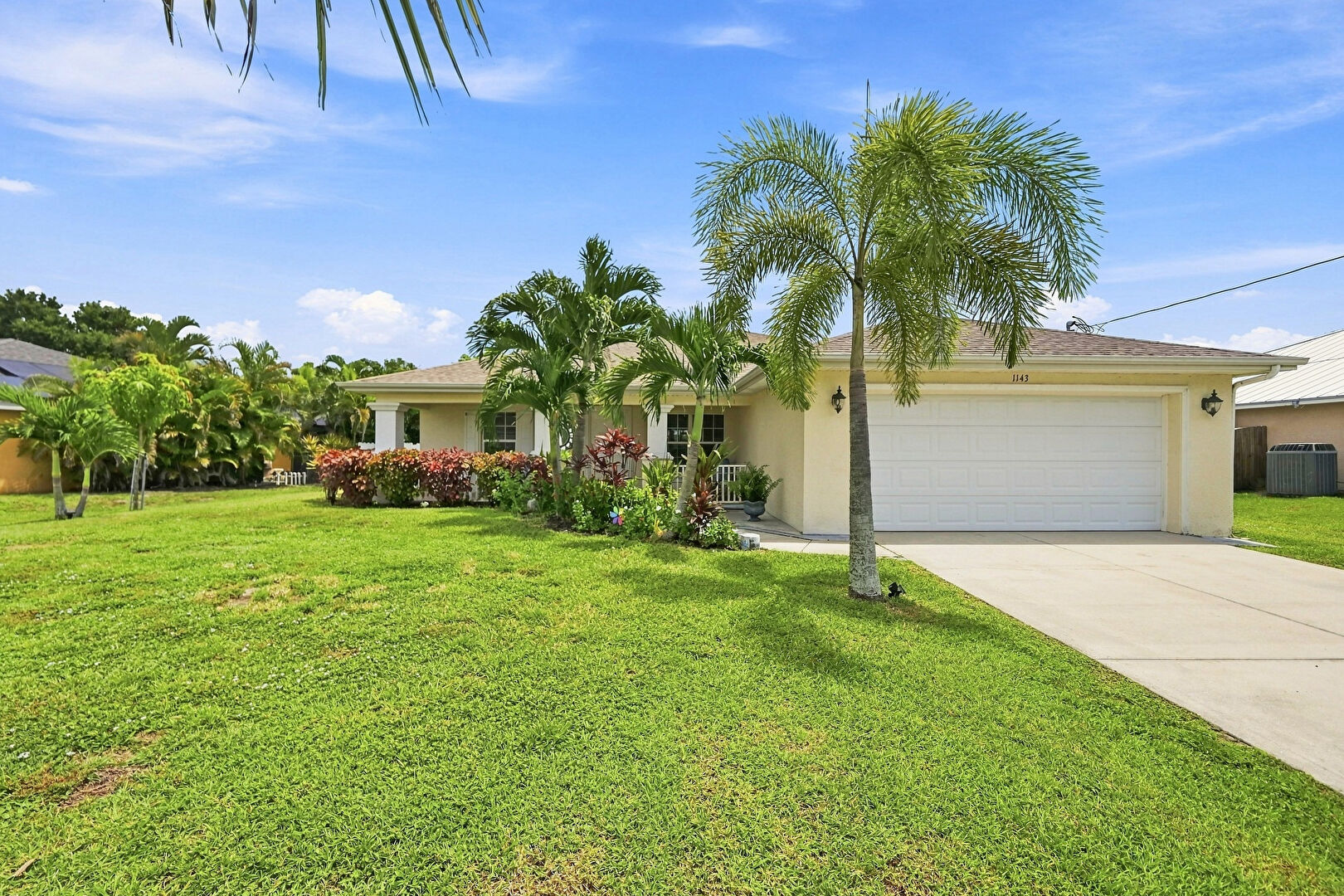 Front at 1143 Northwest 19th Place, Cape Coral, FL 33993, listed by Sande Ellis