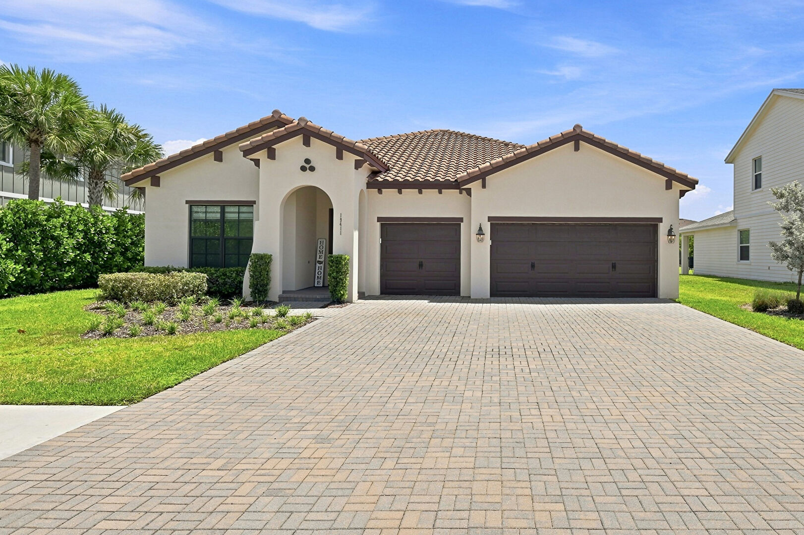 Front at 19411 Broad Shore Walk, Loxahatchee, FL 33470, listed by Milva Skorish