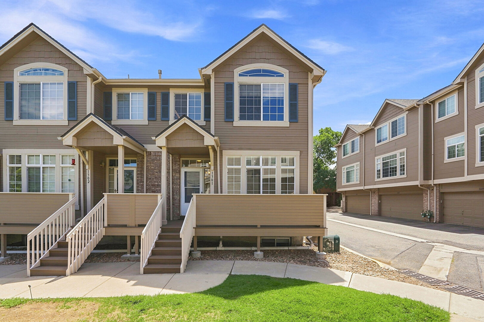 Front at 5555 East Briarwood Avenue #1301, Centennial, CO 80122, listed by Taylor Haas