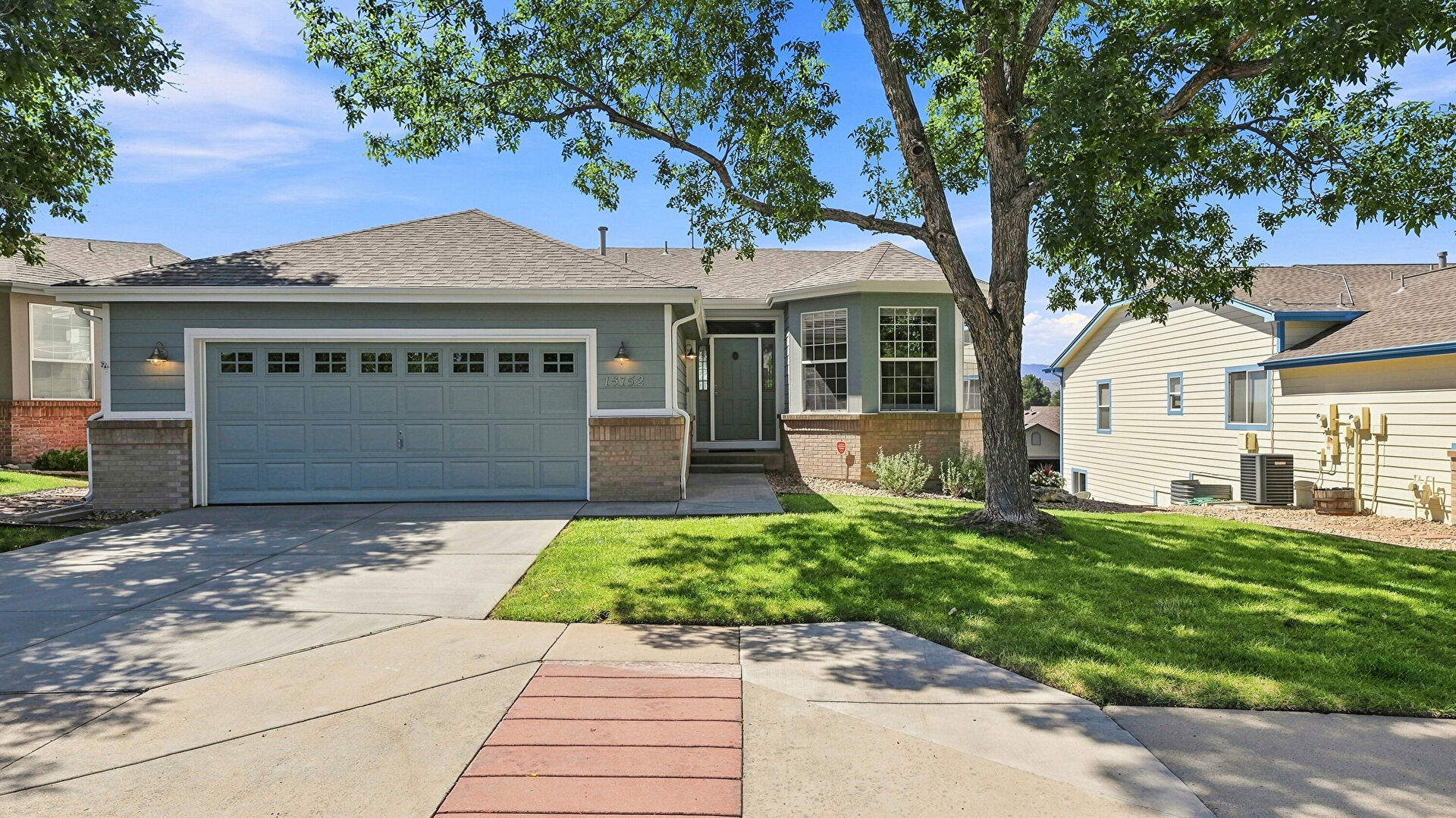 Front at 13152 W Asbury Circle, Denver, CO 80228, listed by Jane Pearson