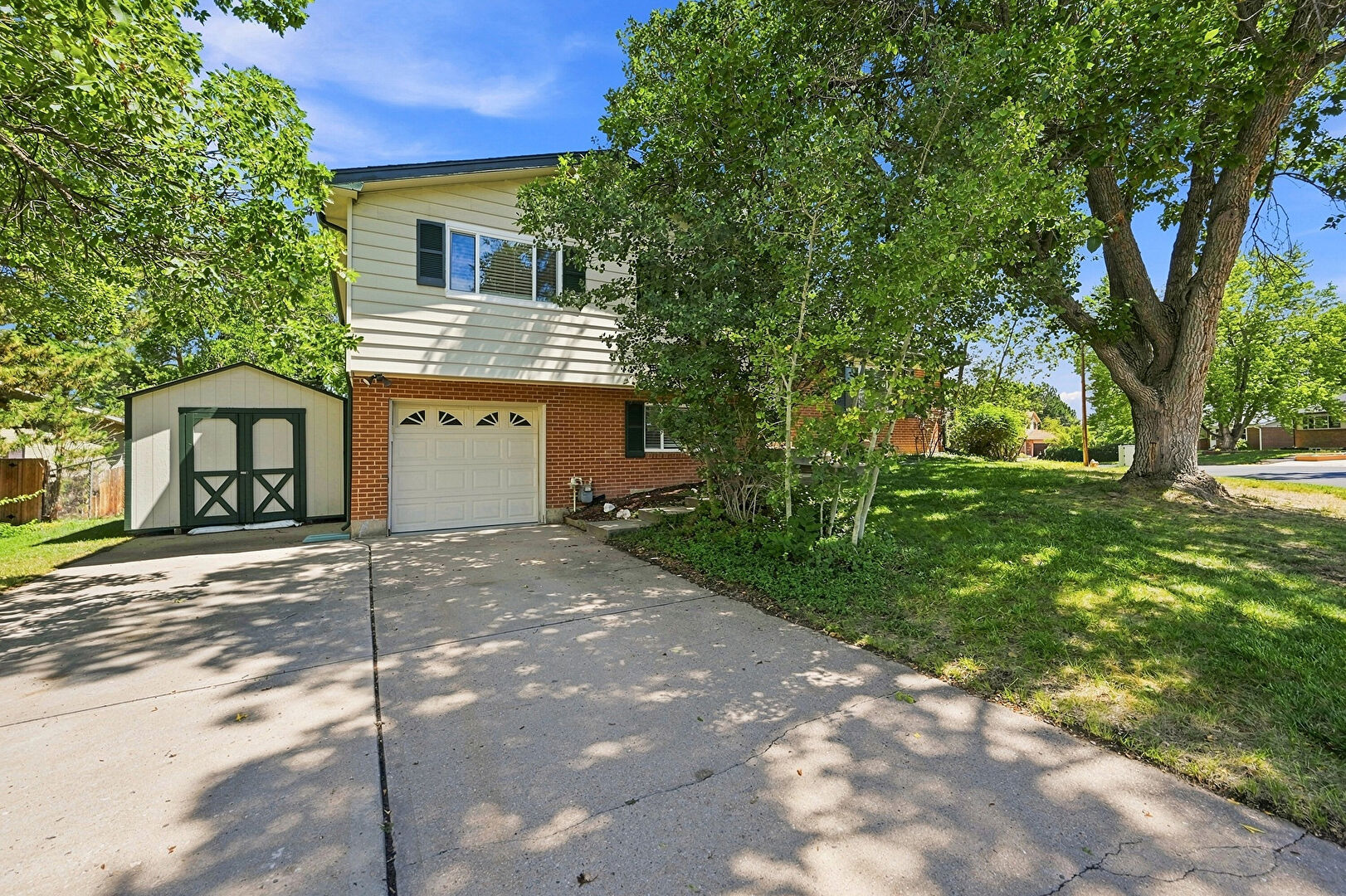 Front at 6850 South Downing Circle West, Centennial, CO 80122, listed by Ted Peterson Care Real Estate