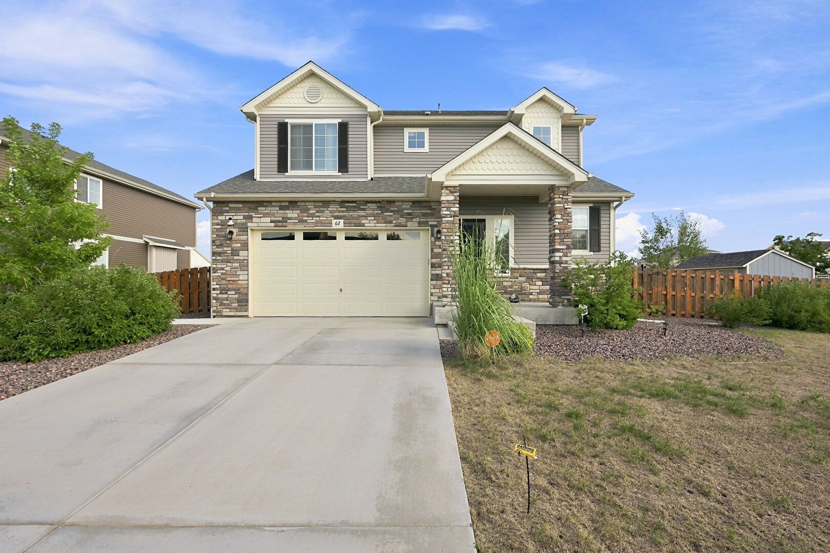Front at 62 North Newcastle Way, Aurora, CO 80018, listed by Joanita Serwadda