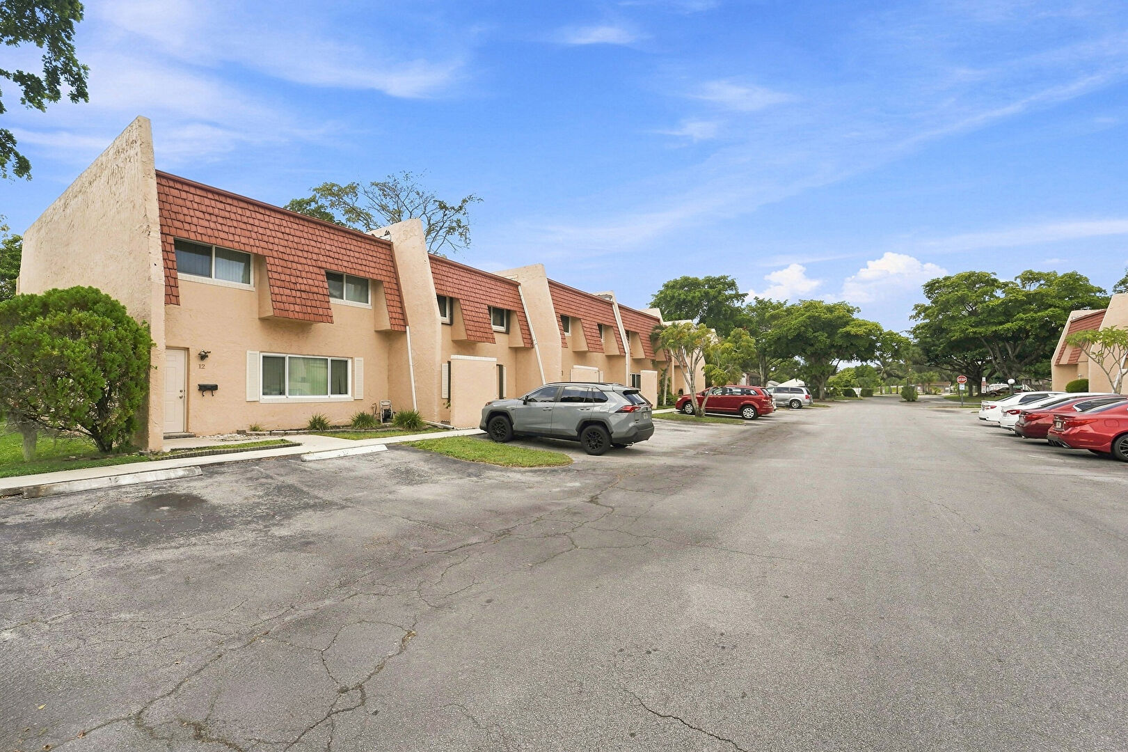 Front at 6 Spinning Wheel Lane, Tamarac, FL 33319, listed by Alex Simpson