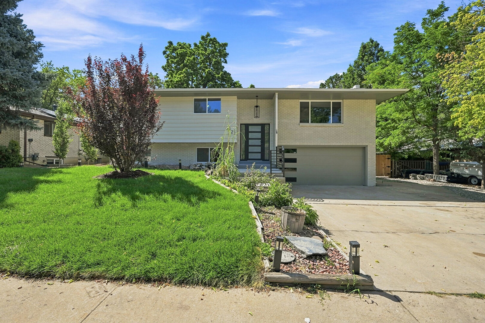 Front at 9522 West 64th Place, Arvada, CO 80004, listed by Robert Gruber