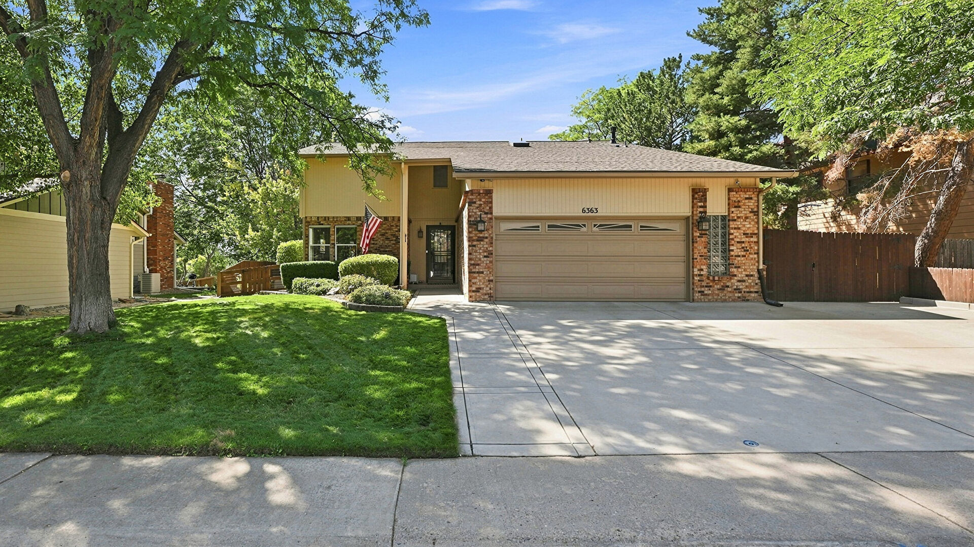 Front at 6363 South Reed Way, Littleton, CO 80123, listed by Tamila Aspen