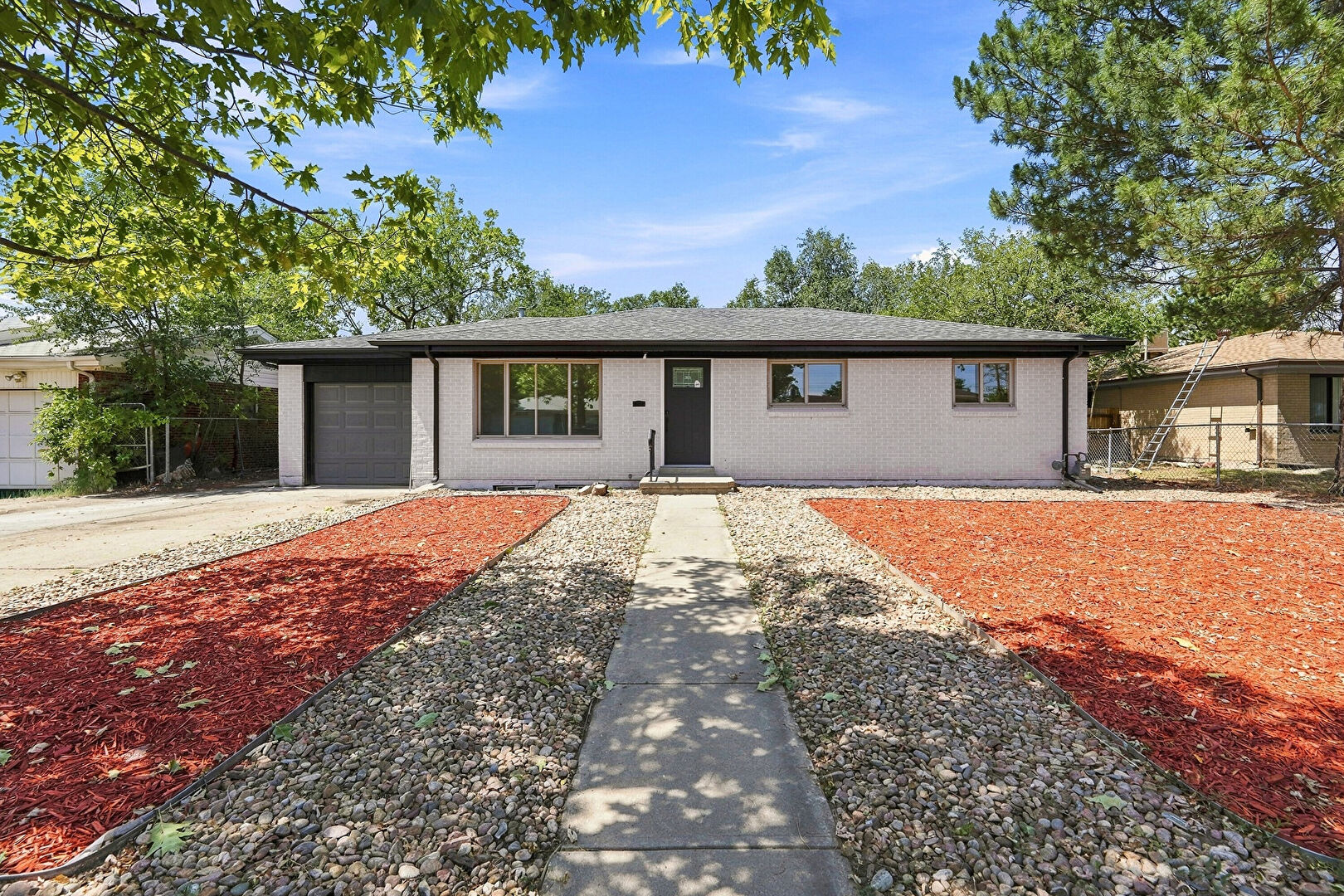 Front at 3113 Worchester Street, Aurora, CO 80011, listed by Magali Fredrick