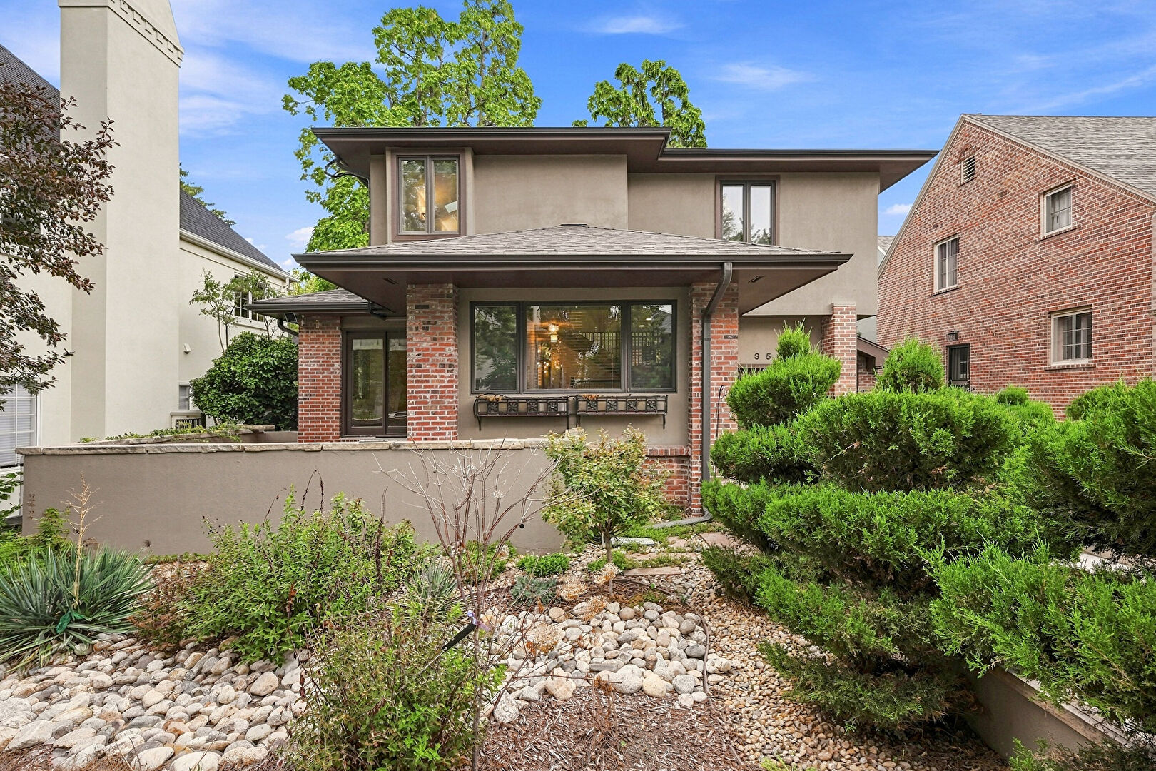 Front at 350 Marion Street, Denver, CO 80218, listed by Tamila Aspen