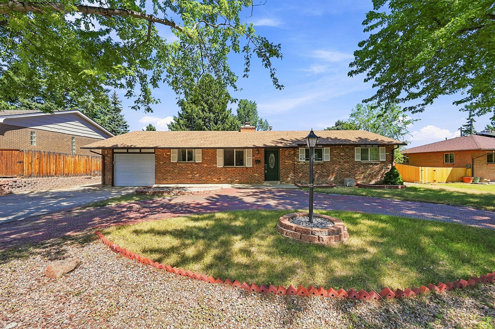 Front at 13695 West Alaska Place, Lakewood, CO 80228, listed by Rockland Miller