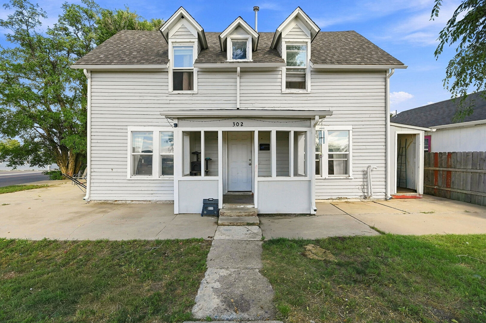 Front at 302 12th Avenue, Greeley, CO 80631, listed by Suzanne Ekeler