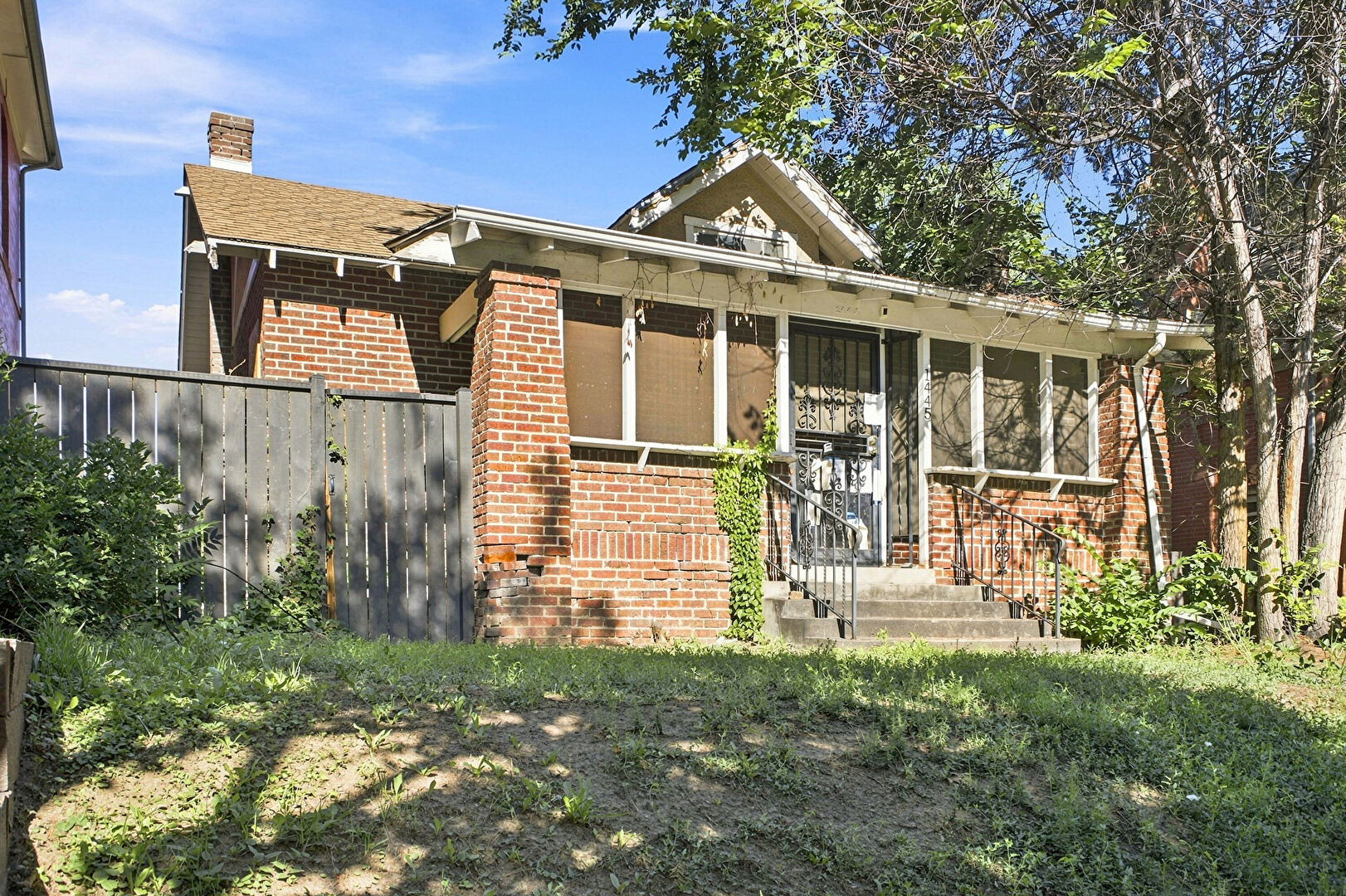 Front at 1445 Saint Paul Street, Denver, CO 80206, listed by Andria and Eric Stashak
