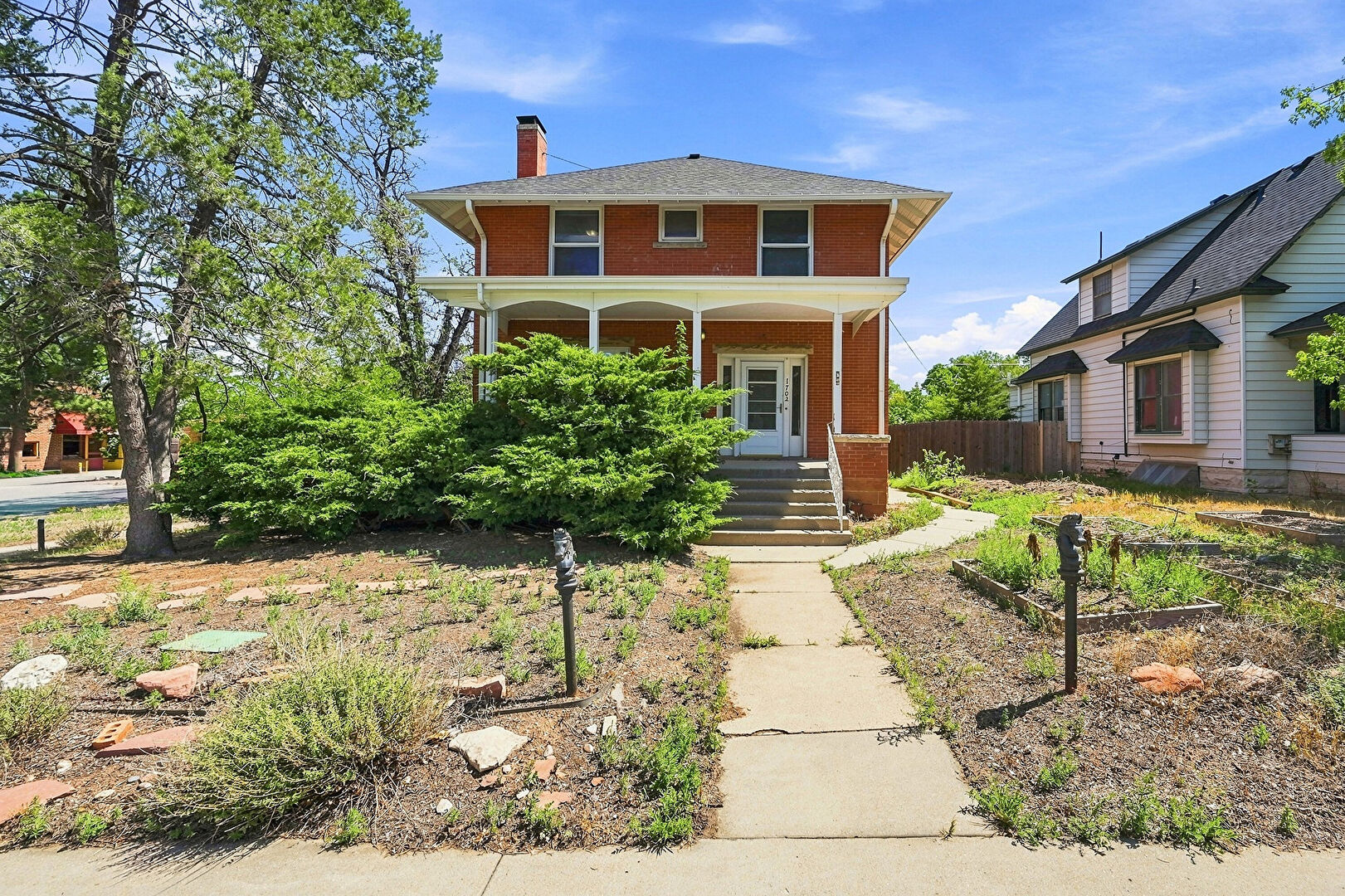 Front at 1702 11th Ave, Greeley, CO 80631, listed by Laura Petrick