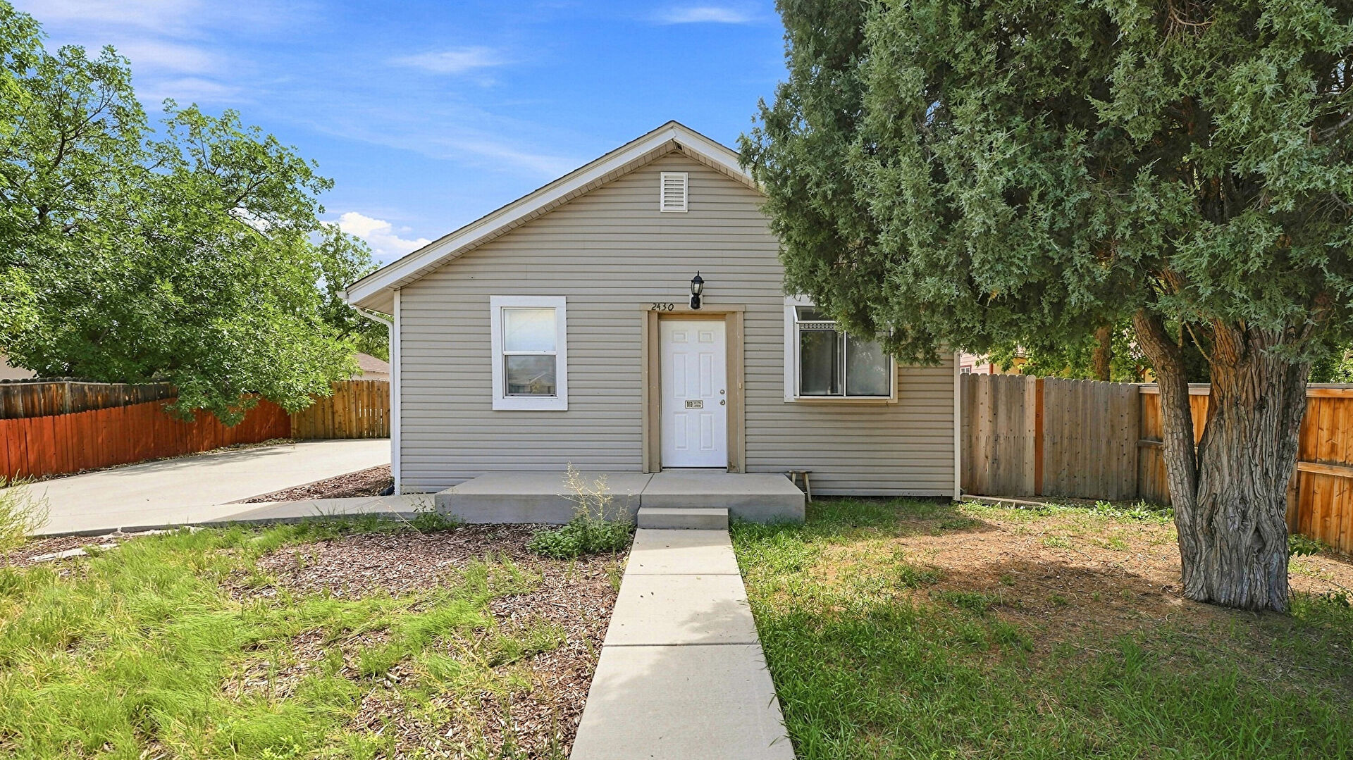 Front at 2430 West Iliff Avenue, Denver, CO 80219, listed by Luxe Home Group