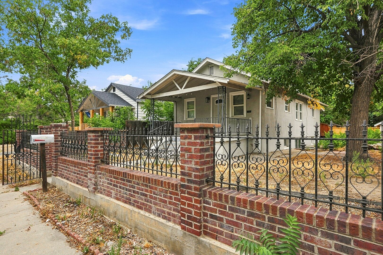 Front at 4774 Pennsylvania Street, Denver, CO 80216, listed by Debra Graves