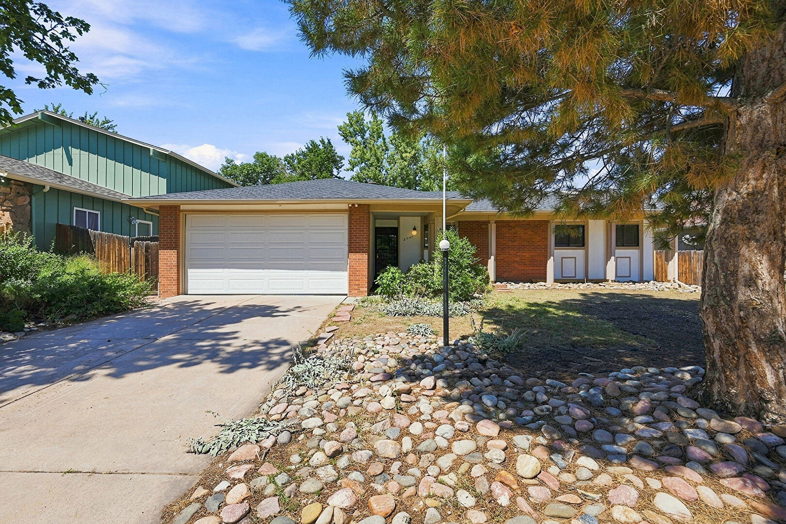Front at 3748 South Mission Parkway, Aurora, CO 80013, listed by Mike R Brady