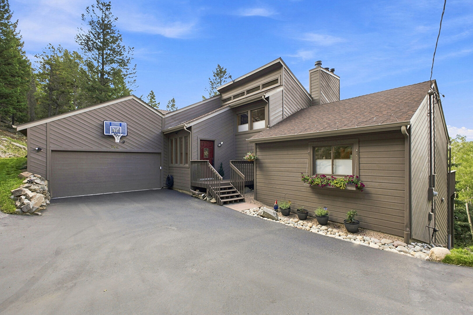 Front at 160 Meadowlark Drive, Evergreen, CO 80439, listed by Jessica Gentry