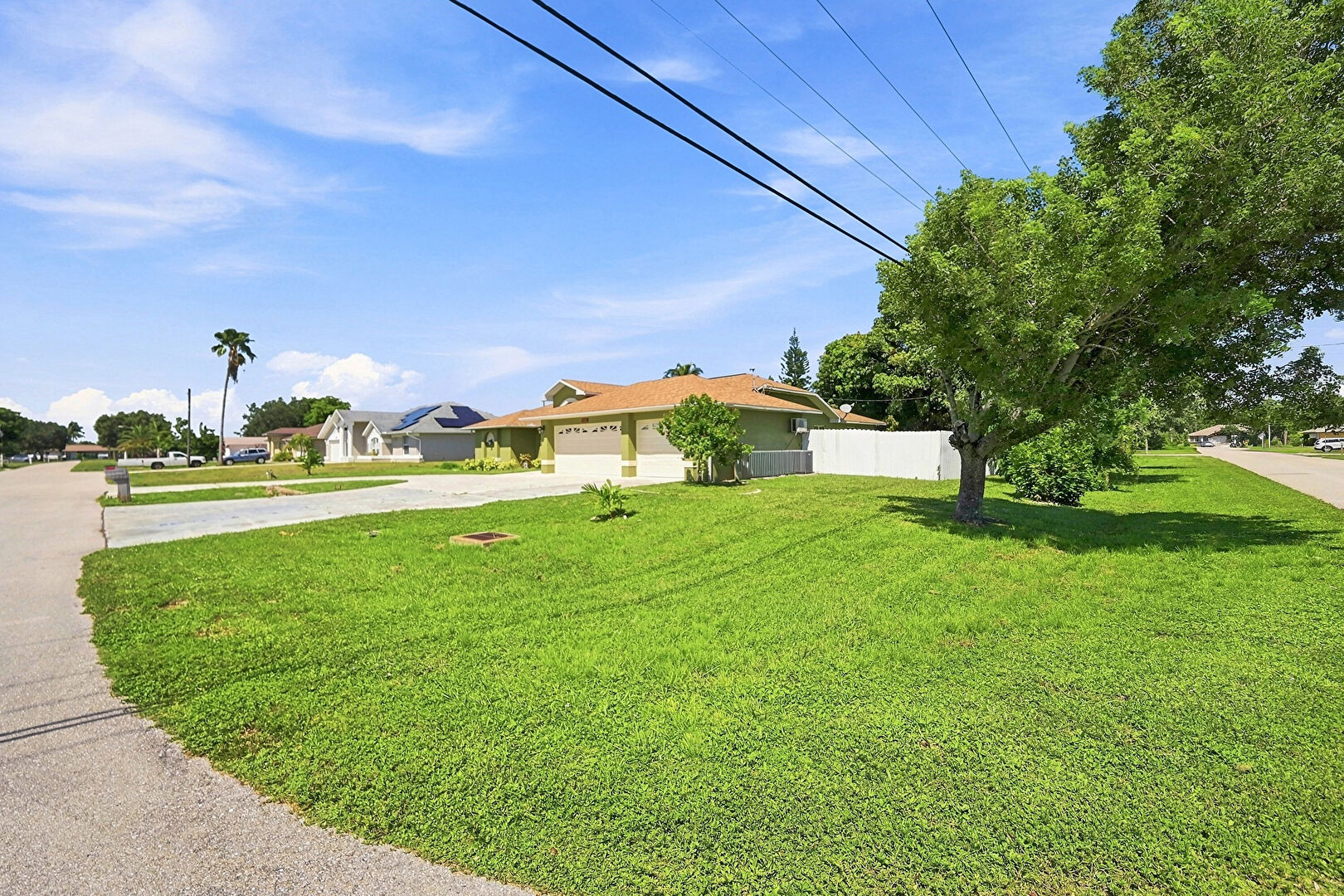 Front at 1239 Southeast 23rd Avenue, Cape Coral, FL 33990, listed by Rebecca Giacobba