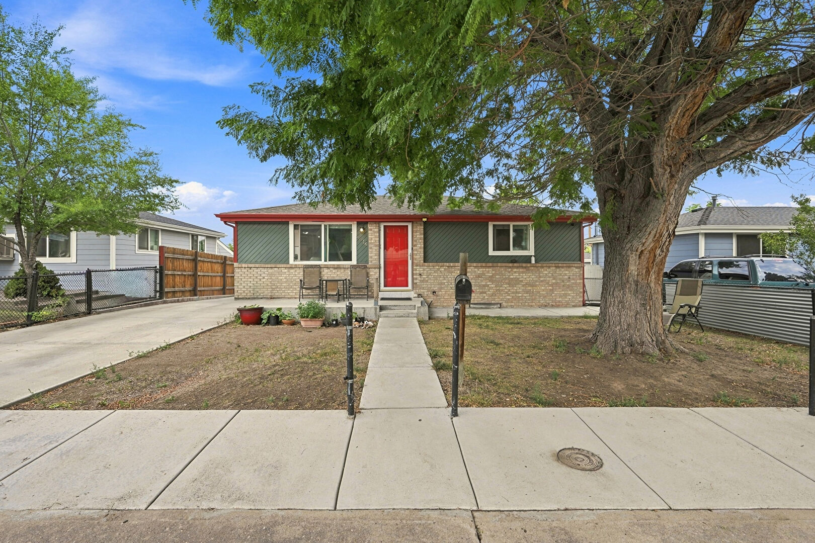 Front at 4615 West Gill Place, Denver, CO 80219, listed by Yameel Marquez