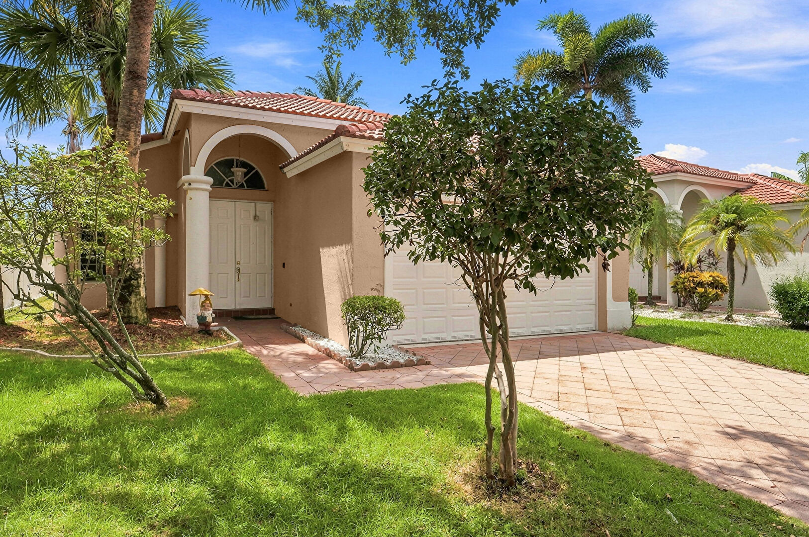 Front at 12376 Northwest 53rd Street, Coral Springs, FL 33076, listed by Lucy Venegas