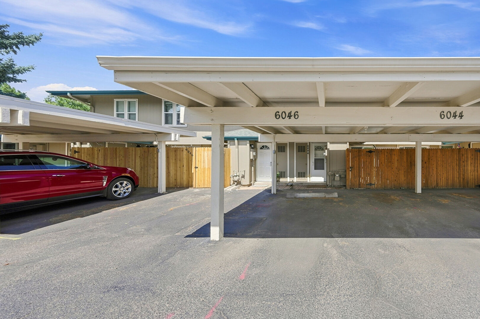 Carport at 6046 S Willow Way, Greenwood Village, CO 80111, listed by Jennifer Bozarth, MLS ID: 2780641