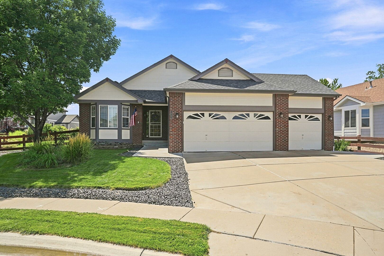 Front at 16484 West 62nd Avenue, Arvada, CO 80004, listed by Angela Kemper