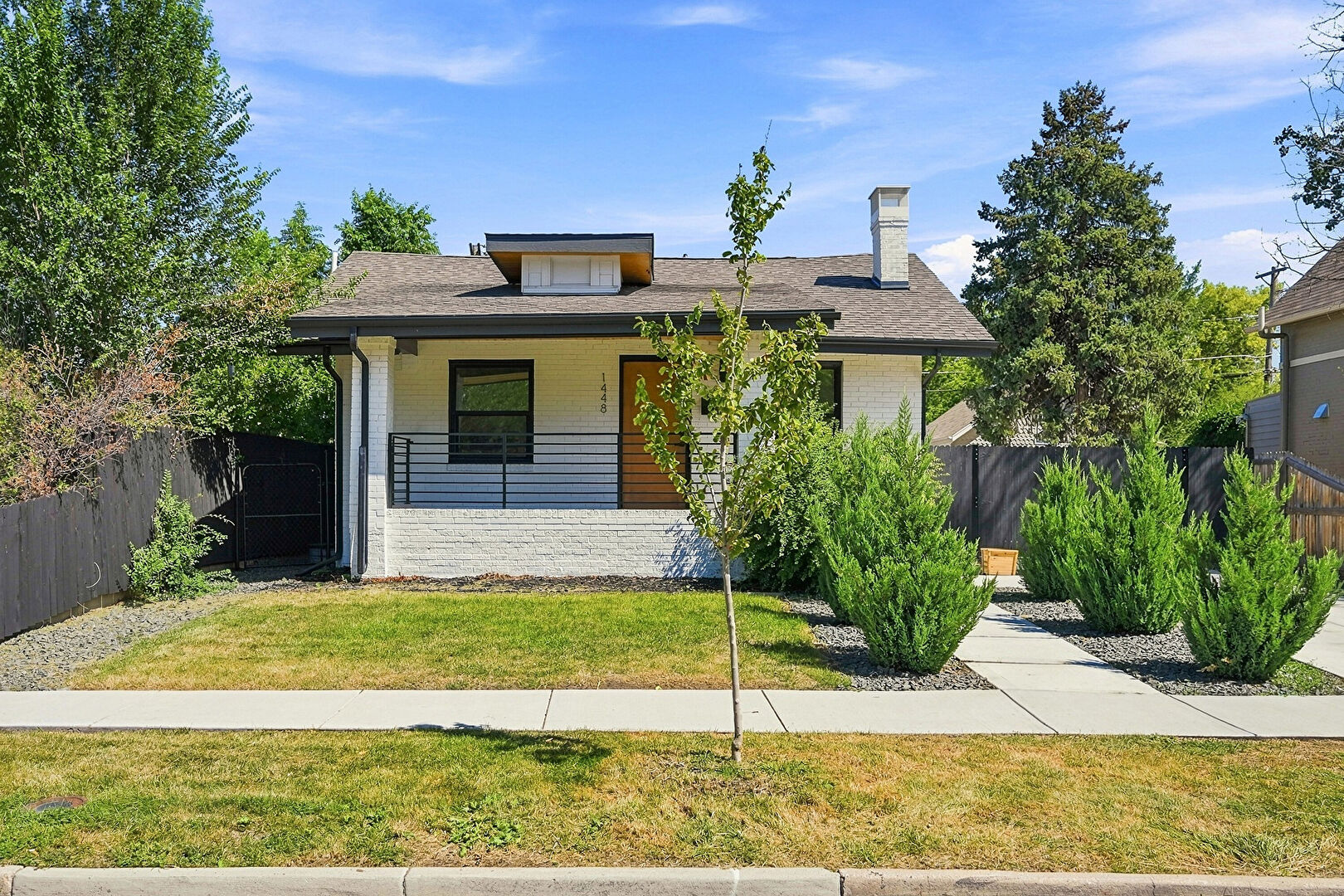 Front at 1448 Niagara Street, Denver, CO 80220, listed by Christie Vincent