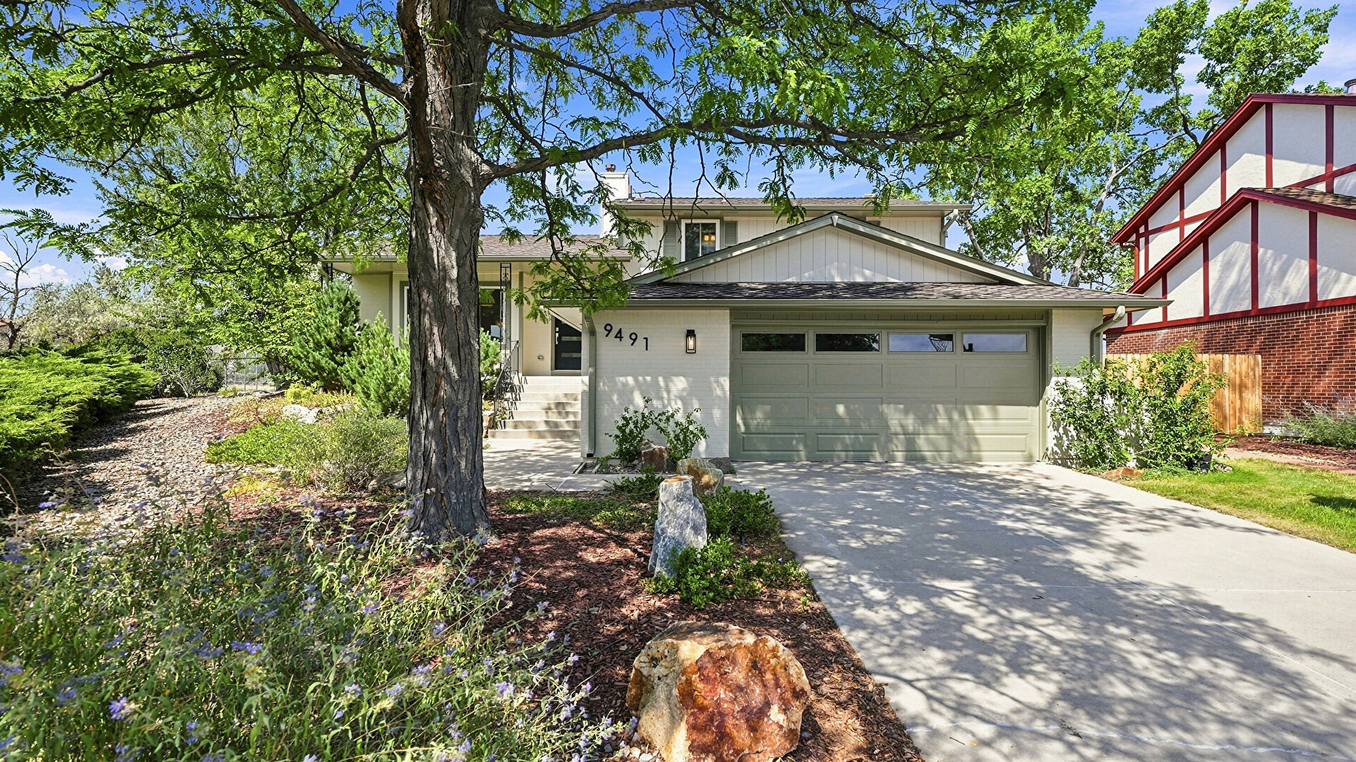Front at 9491 West Jewell Place, Lakewood, CO 80227, listed by Robert Gruber