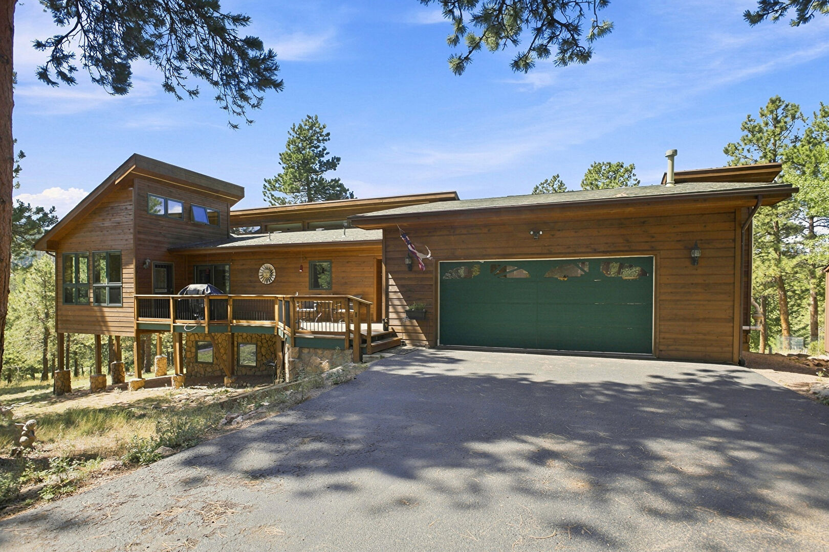 Front at 9749 Hilldale Drive, Morrison, CO 80465, listed by The Dolph Team